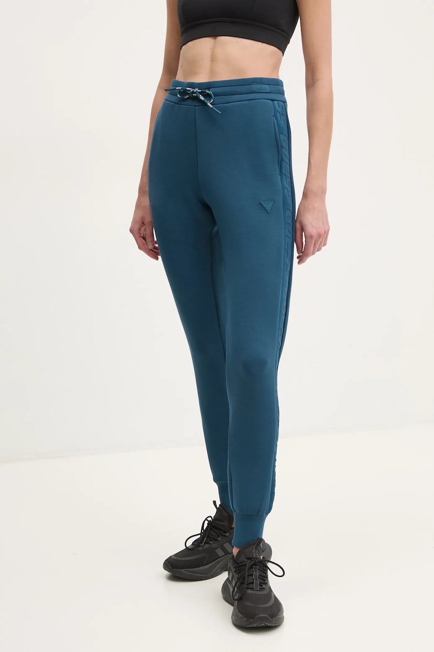 Levně Tepláky Guess ALLIE fialová barva, s potiskem, V2YB18 K7UW2