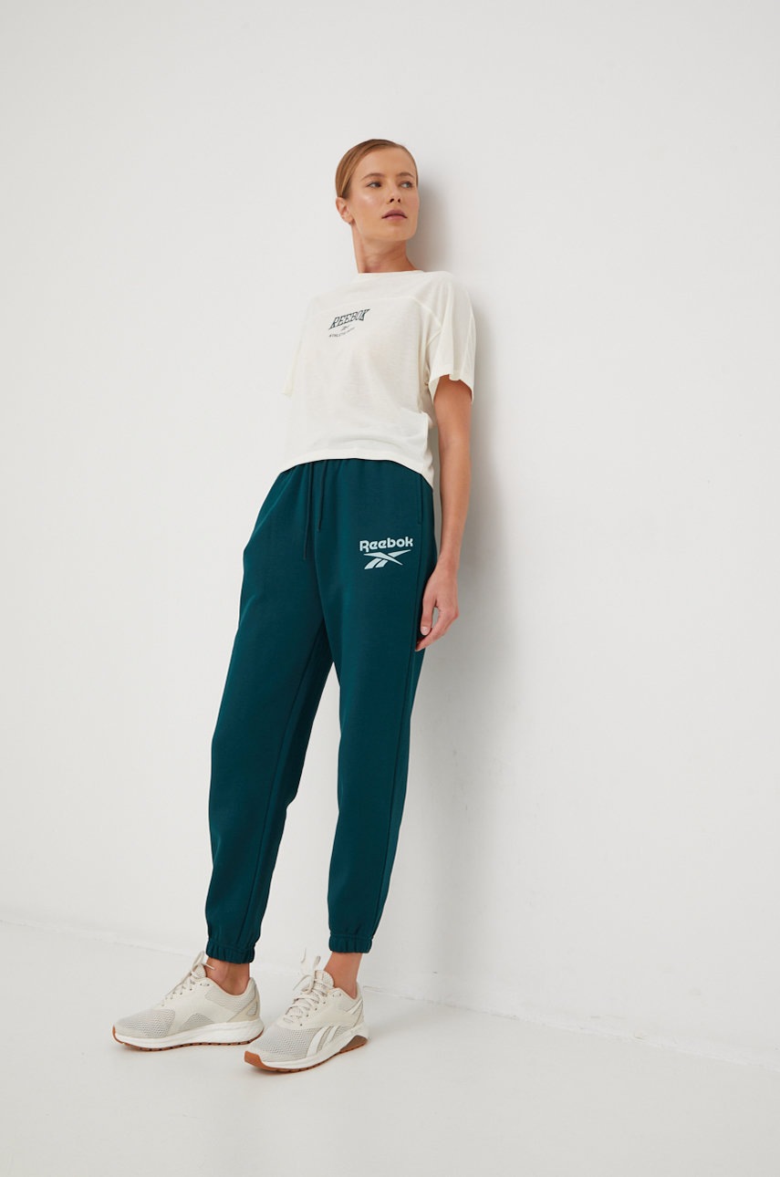 

Спортивные штаны Reebok женские цвет зелёный с принтом