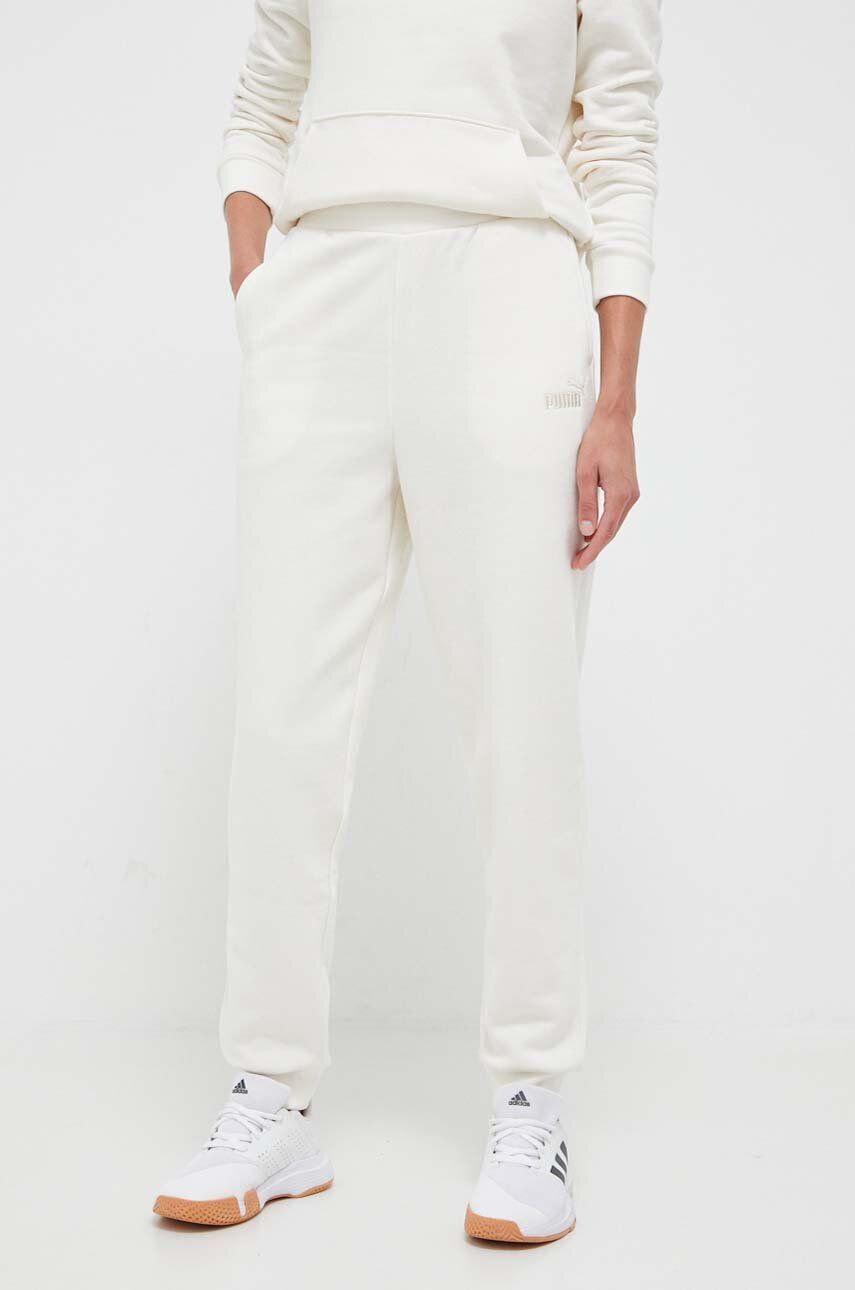 Kalhoty Puma dámské, béžová barva, hladké - béžová -  Hlavní materiál: 66 % Bavlna