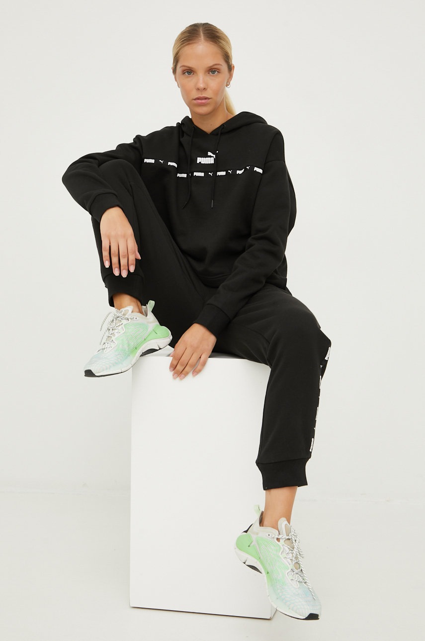 

Спортивные штаны Puma женские цвет чёрный с аппликацией