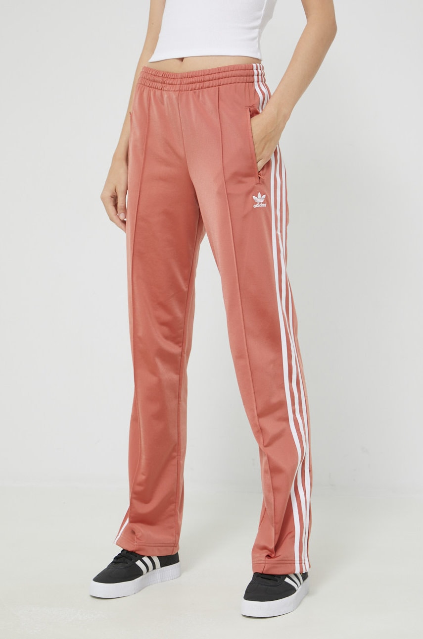 Levně Tepláky adidas Originals dámské, oranžová barva, s aplikací