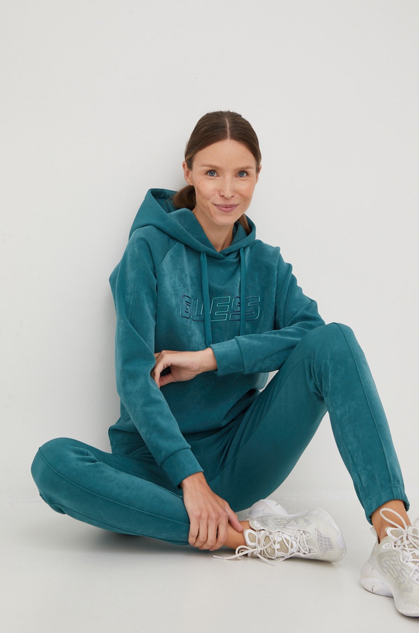 

Спортивні штани Guess жіночі колір зелений з аплікацією