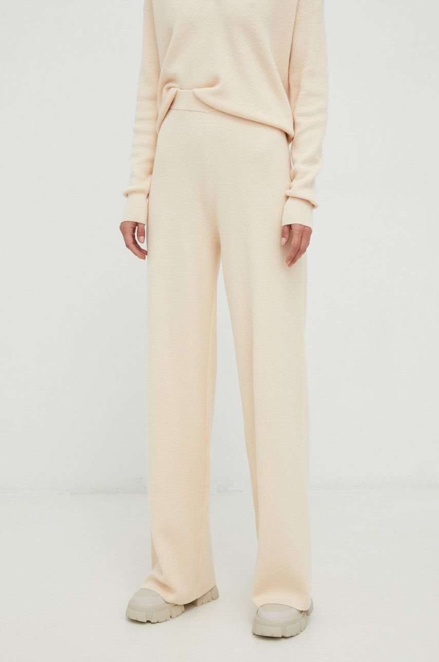Kalhoty s příměsí vlny Calvin Klein dámské, béžová barva, jednoduché, high waist - béžová -  48