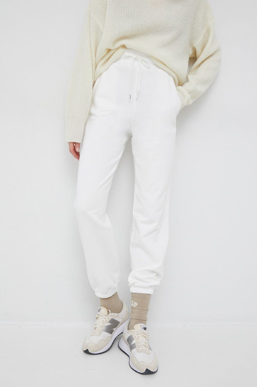 United Colors of Benetton pantaloni de trening din bumbac X Pantone femei, culoarea alb, neted Alb imagine megaplaza.ro