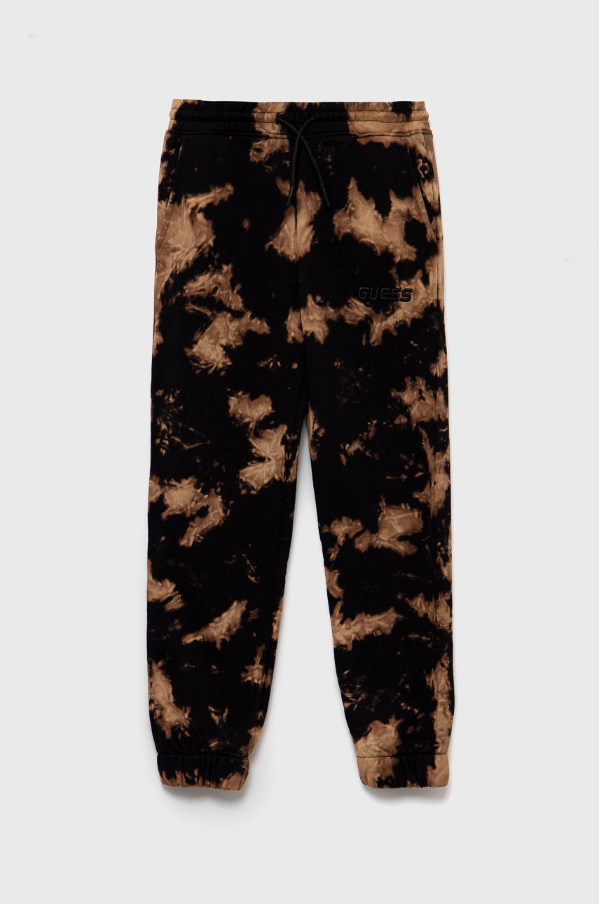 Детские хлопковые штаны Guess цвет чёрный с узором Детские хлопковые штаны Guess цвет чёрный с узором