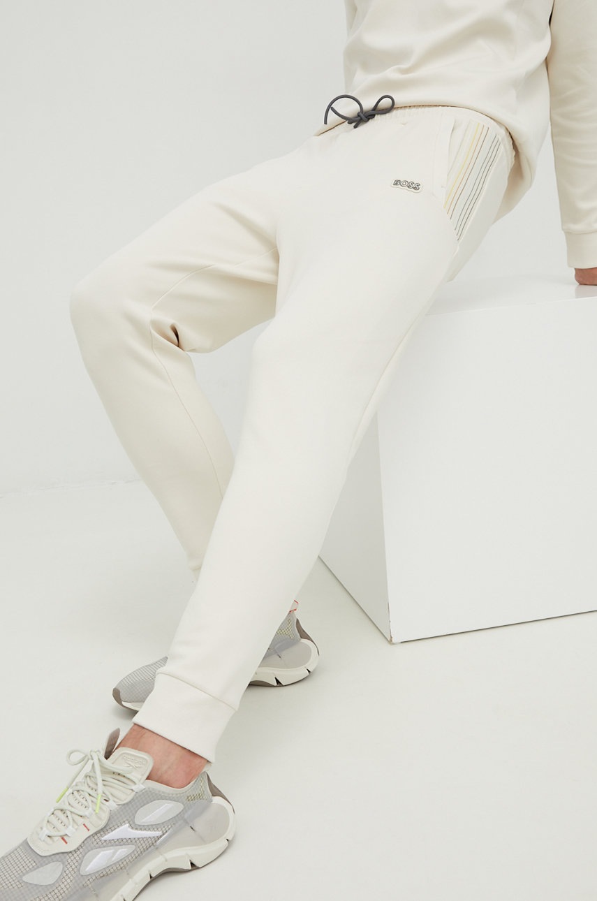 

Спортен панталон BOSS Boss Athleisure в бежово с изчистен дизайн, Бежов
