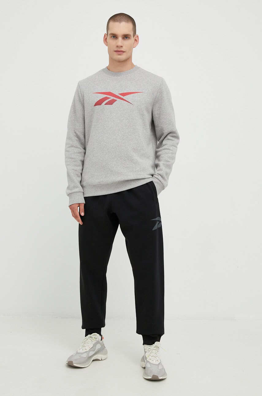 

Спортивные штаны Reebok Classic мужские цвет чёрный с принтом