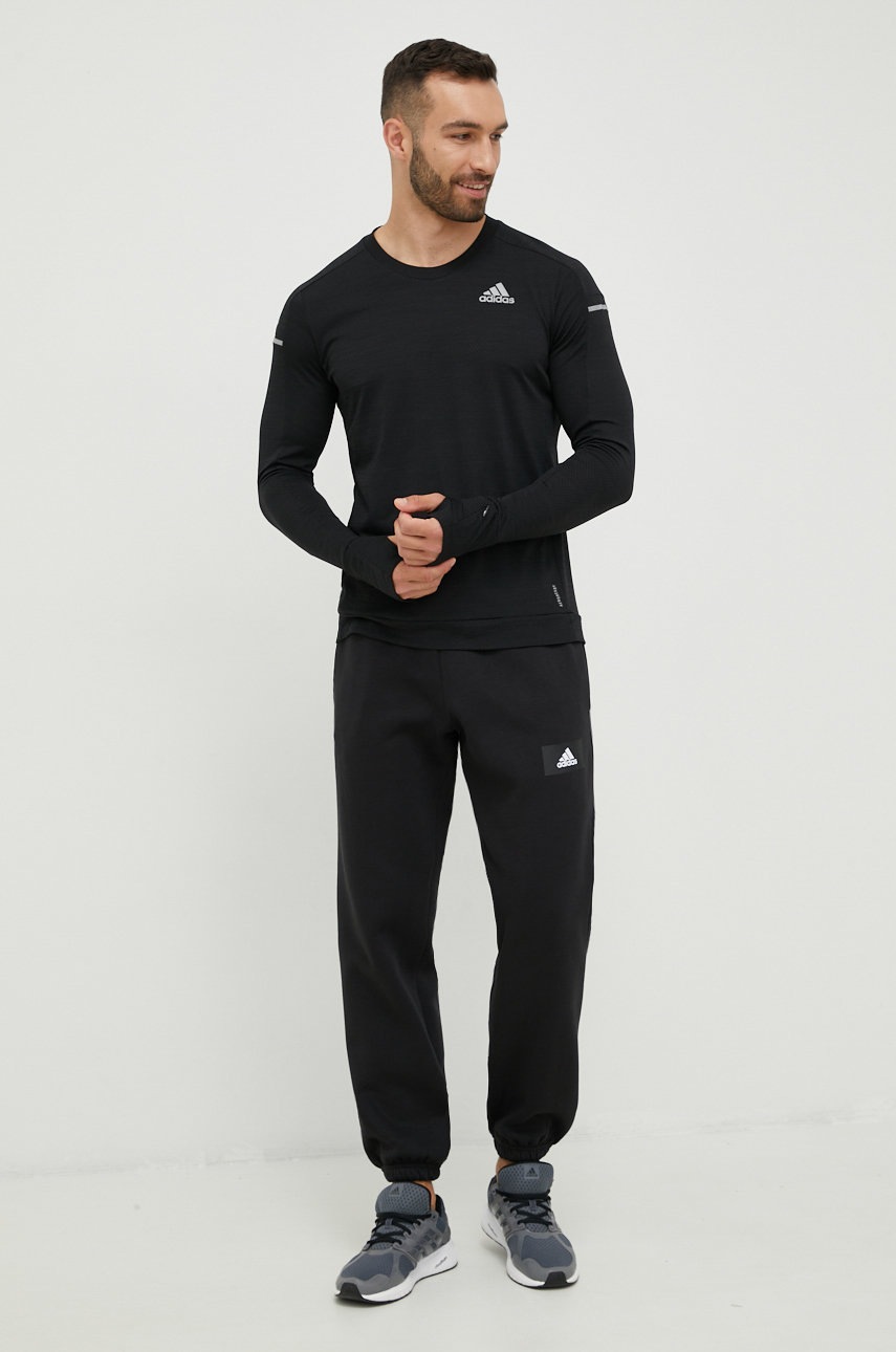 

Спортивные штаны adidas мужские цвет чёрный с принтом