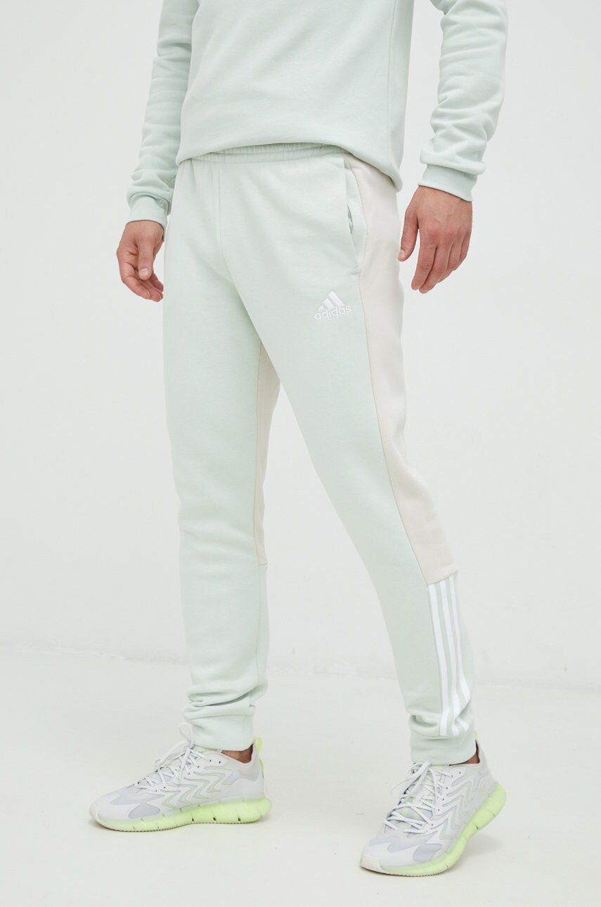 

Спортивные штаны adidas мужские цвет зелёный однотонные
