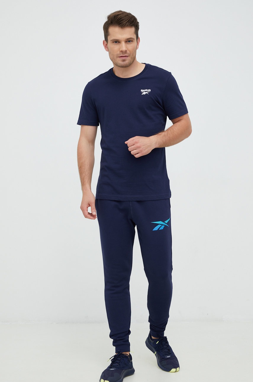 

Спортивные штаны Reebok мужские цвет синий однотонные