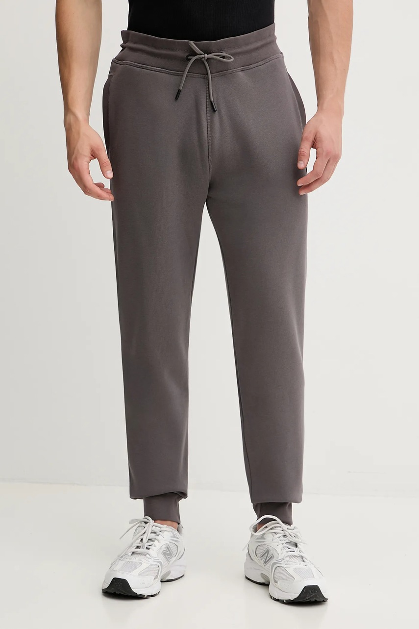 Levně Tepláky Guess růžová barva