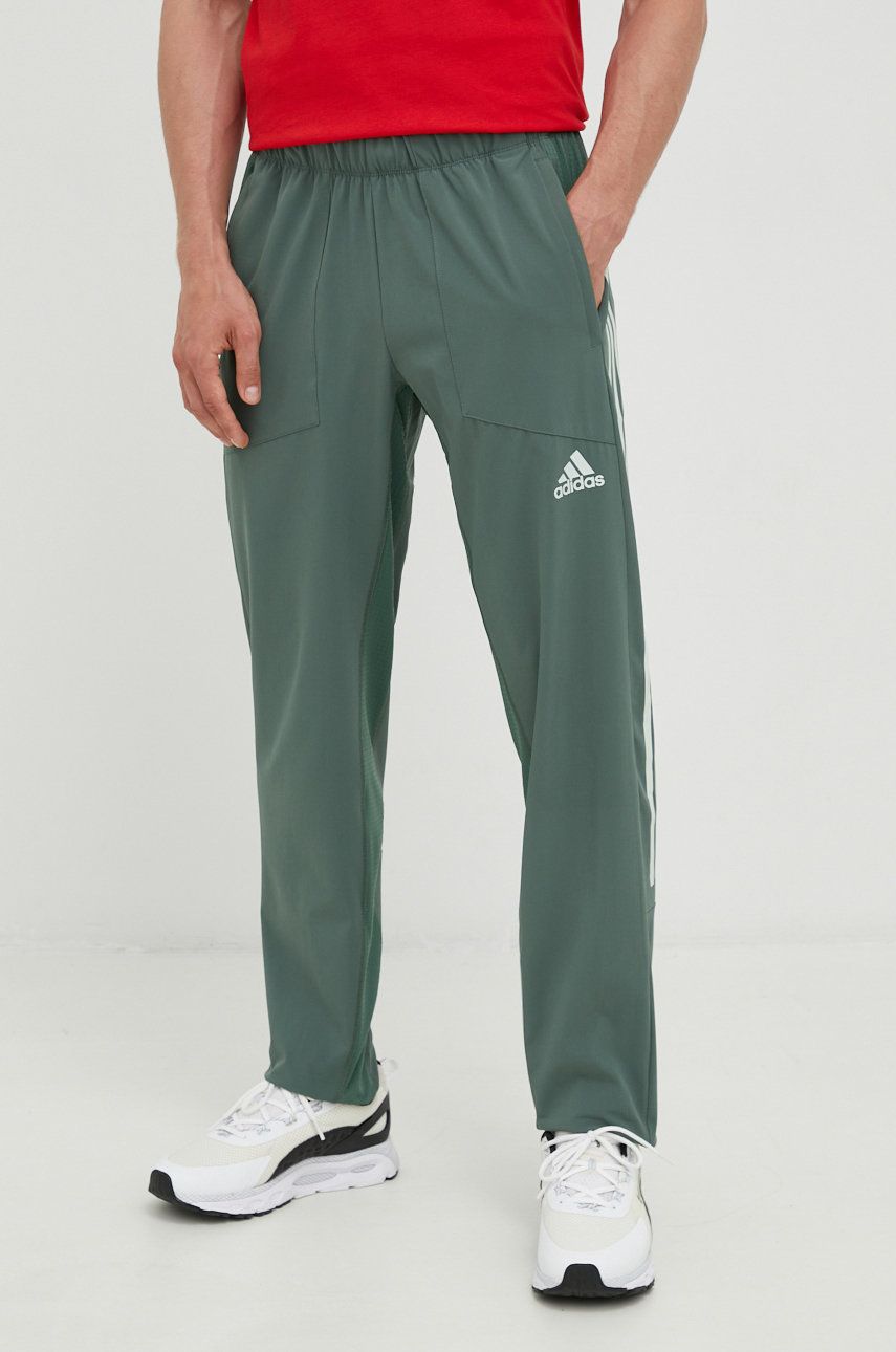 Levně Tréninkové kalhoty adidas Performance pánské, zelená barva, s potiskem