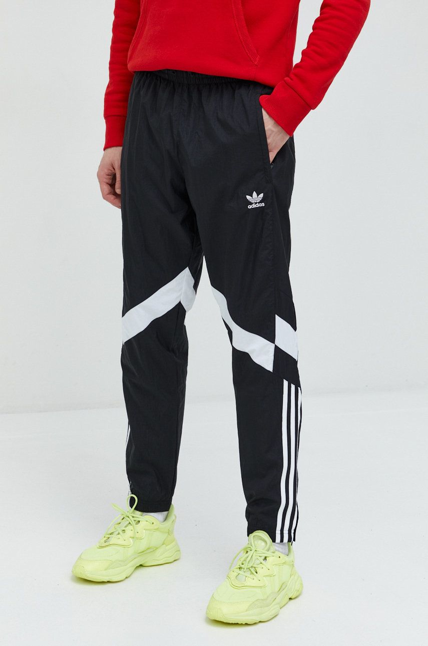 Levně Tepláky adidas Originals pánské, černá barva, s aplikací