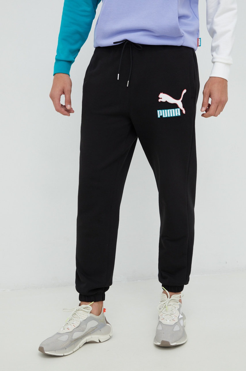 

Бавовняні спортивні штани Puma чоловічі колір чорний з аплікацією