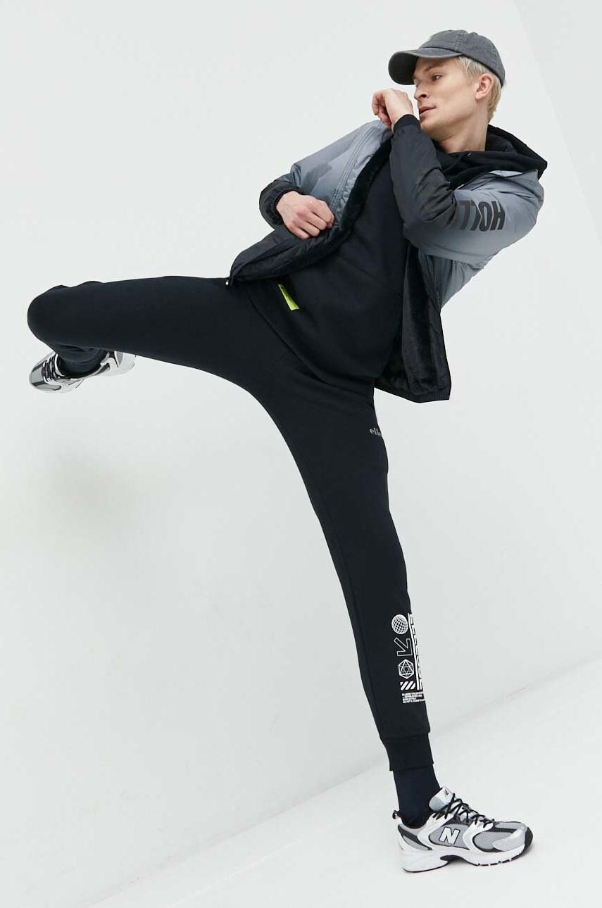 

Спортивные штаны Ellesse мужские цвет чёрный с принтом