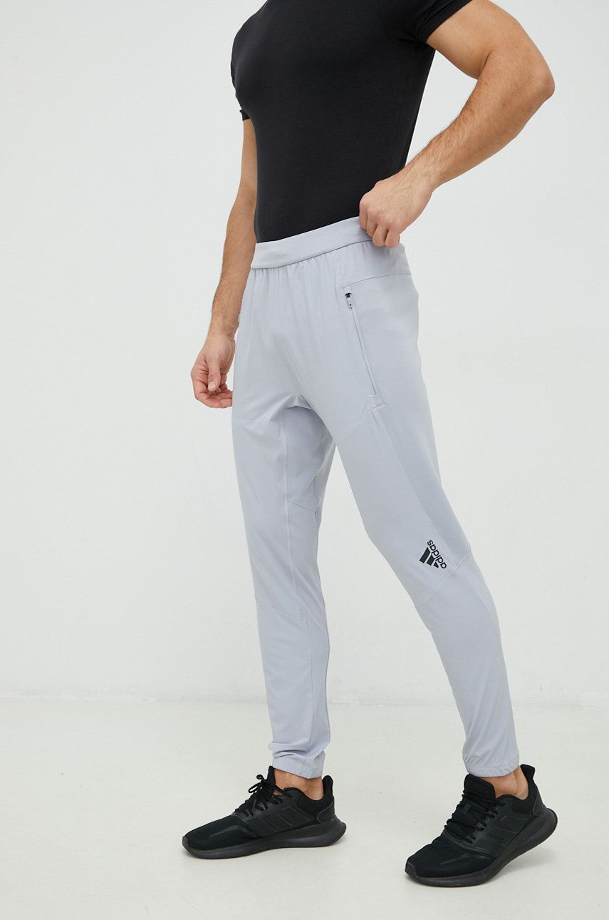 Levně tréninkové kalhoty adidas Performance designed for training pánské, šedá barva, hladké