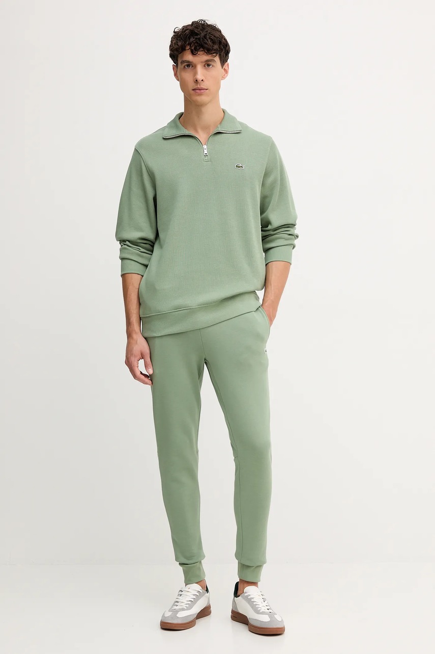 Спортивные штаны Lacoste цвет бежевый однотонная