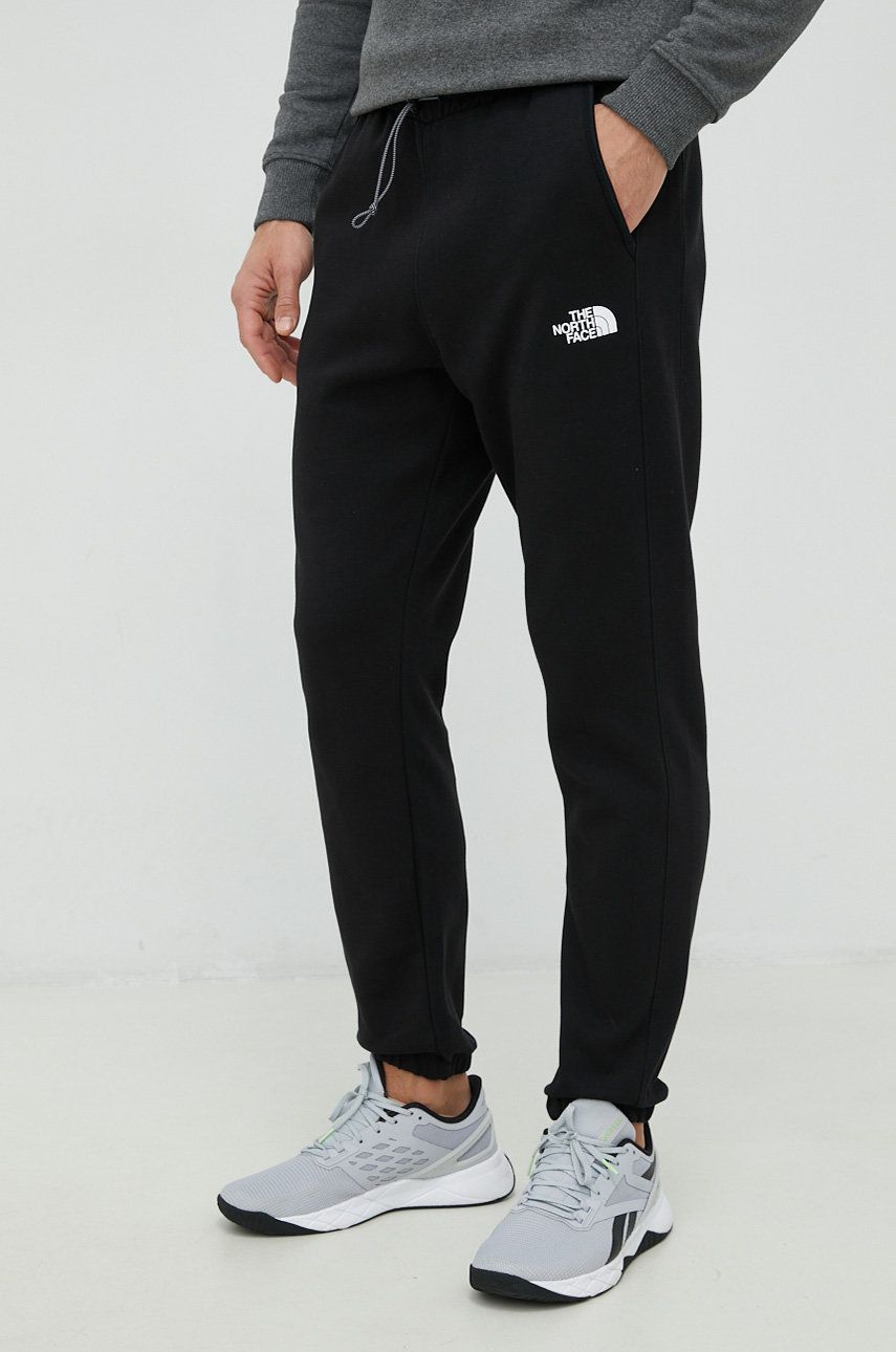 The North Face pantaloni de trening barbati, culoarea negru, neted