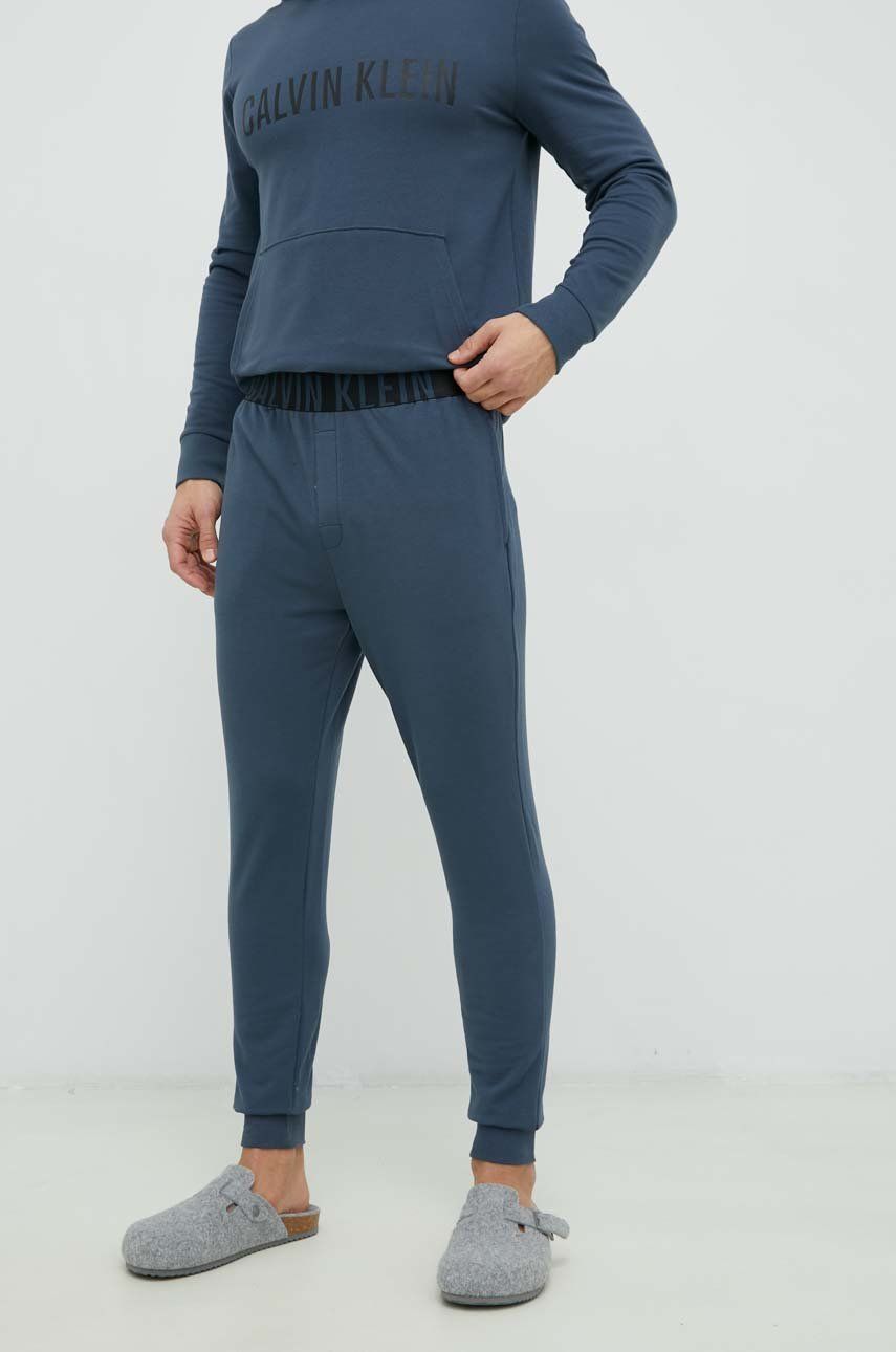 Pyžamové kalhoty Calvin Klein Underwear pánské, - modrá -  57% Bavlna