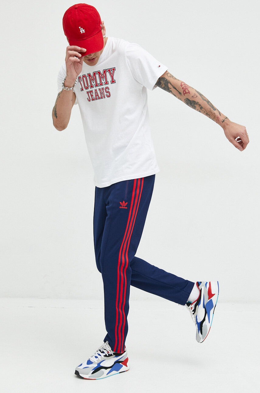 

Спортивные штаны adidas Originals цвет синий с аппликацией