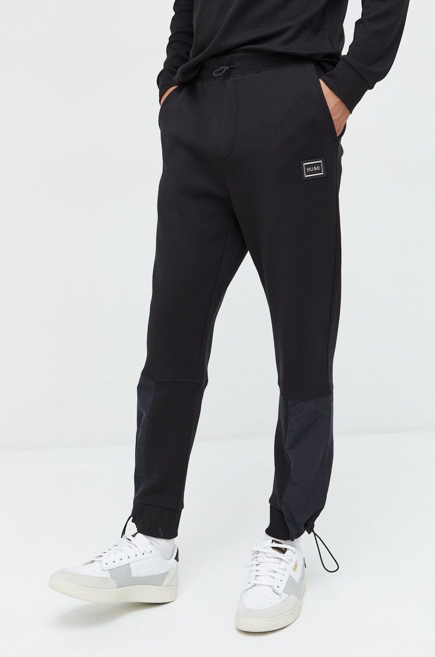 HUGO pantaloni de trening barbati, culoarea negru, neted answear.ro imagine noua