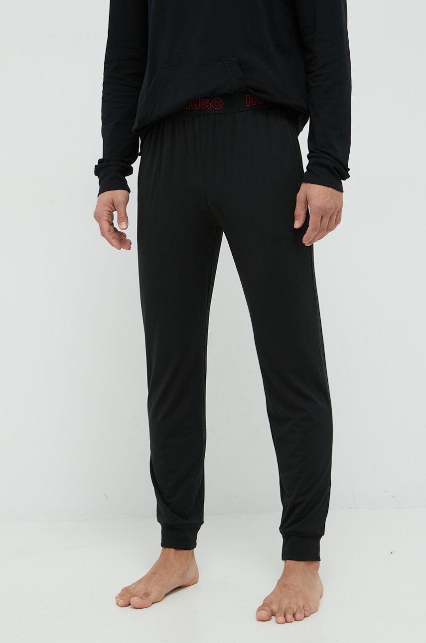Pyžamové kalhoty HUGO pánské, černá barva - černá -  55% Bavlna