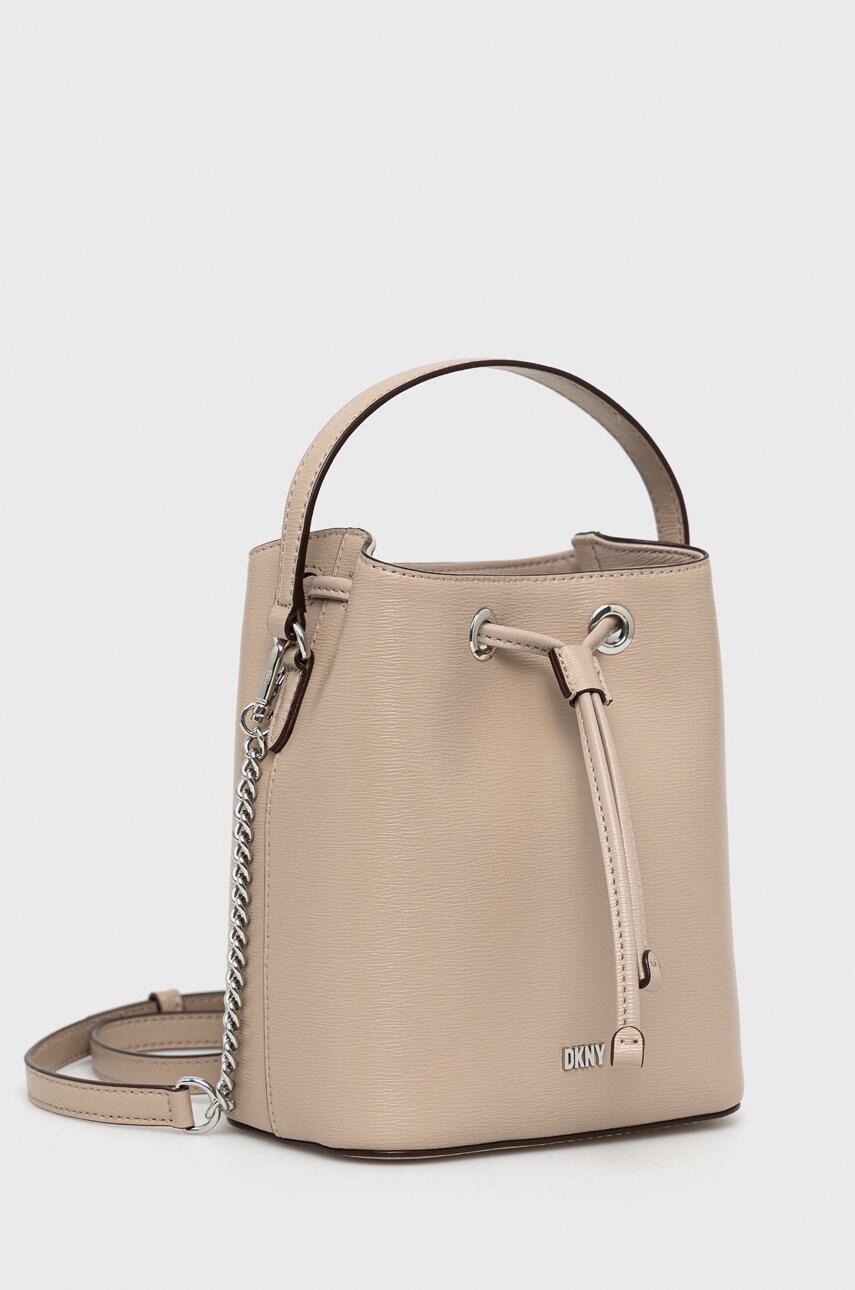 

Шкіряна сумочка Dkny колір бежевий
