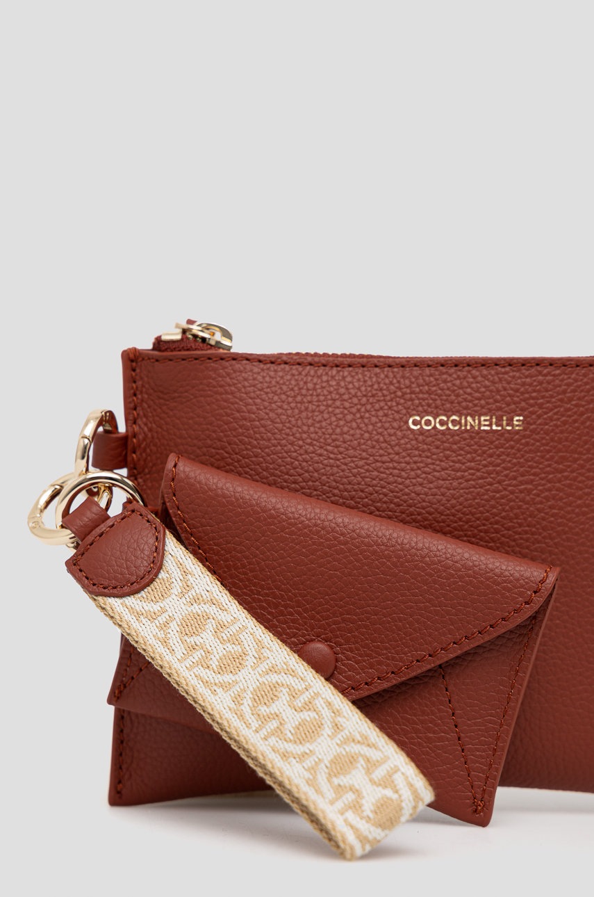 

Шкіряна косметичка Coccinelle жіночий колір бордовий