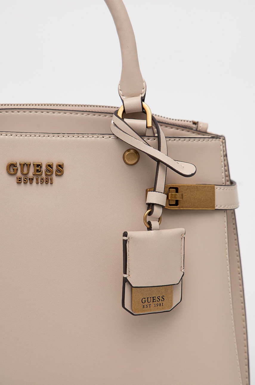 

Сумочка Guess колір бежевий