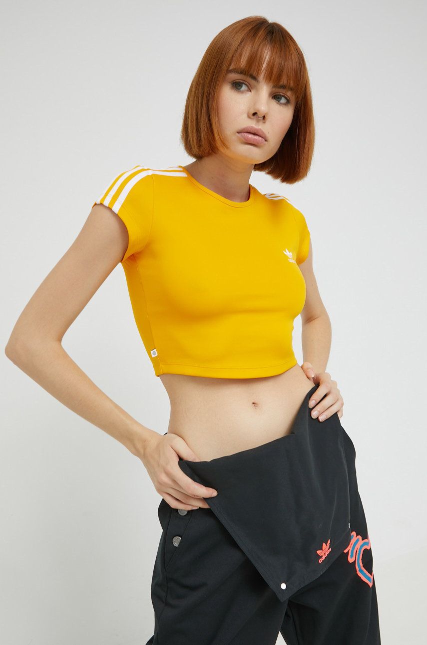 Tričko adidas Originals žlutá barva - žlutá -  89% Polyester