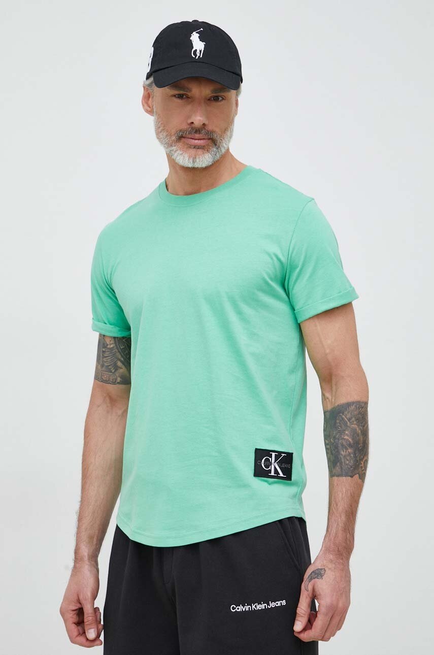 

Памучна тениска Calvin Klein Jeans в тюркоазено с апликация, Тюркоазен