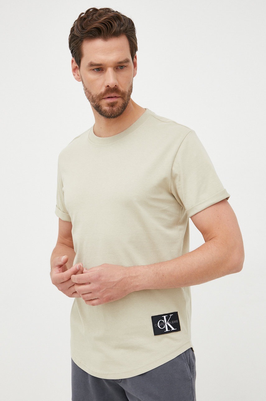 

Памучна тениска Calvin Klein Jeans в зелено с апликация, Зелен