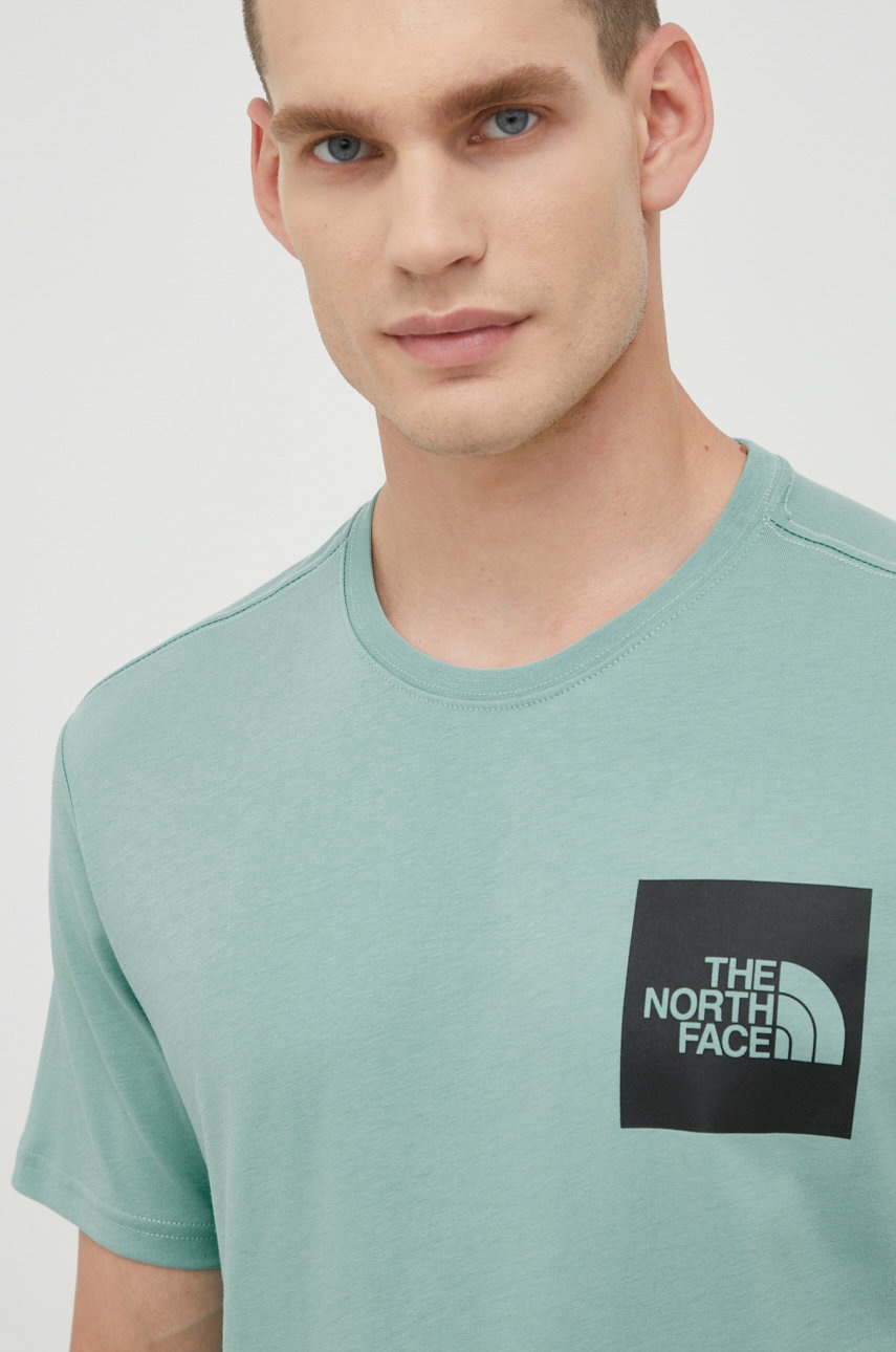 

Тениска The North Face в тюркоазено с изчистен дизайн, Тюркоазен