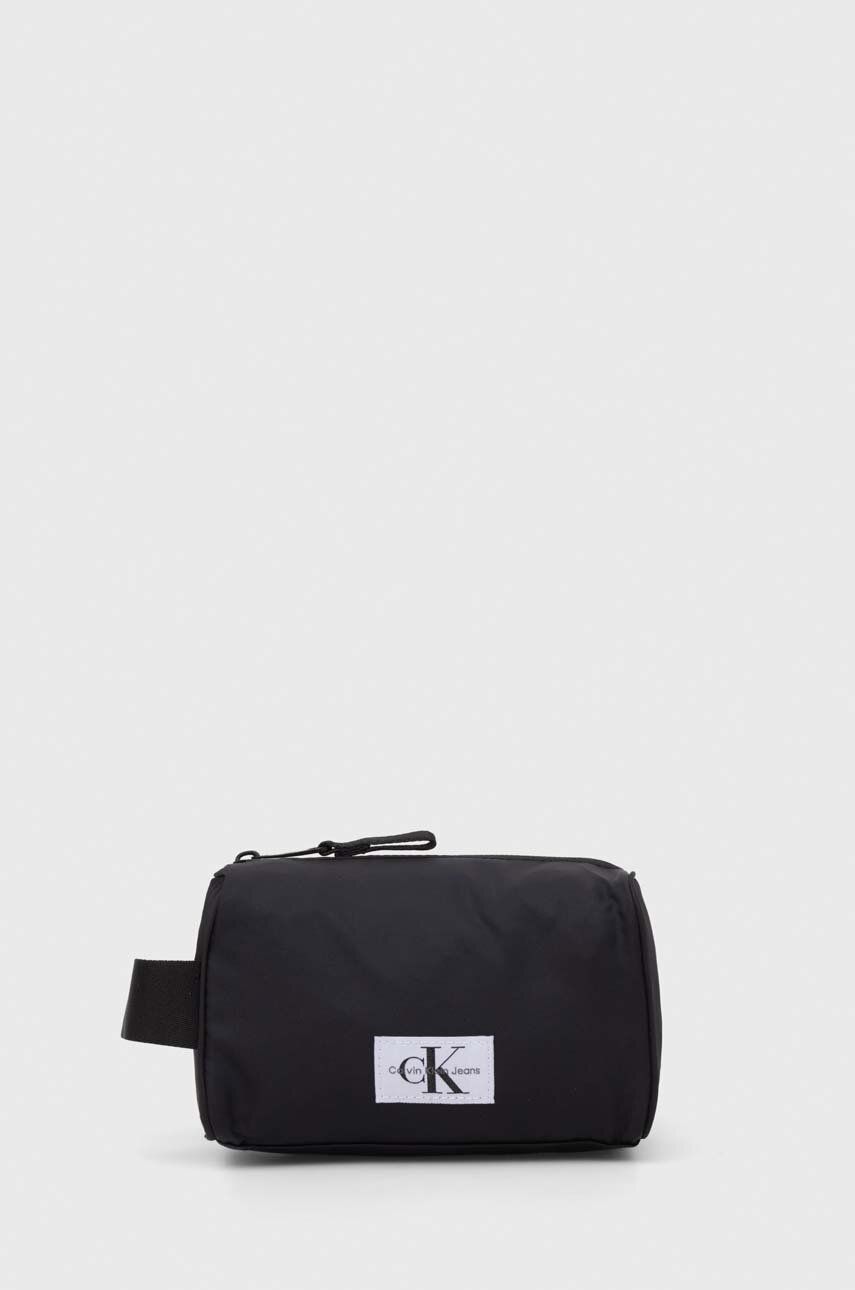 Levně Kosmetická taška Calvin Klein Jeans černá barva