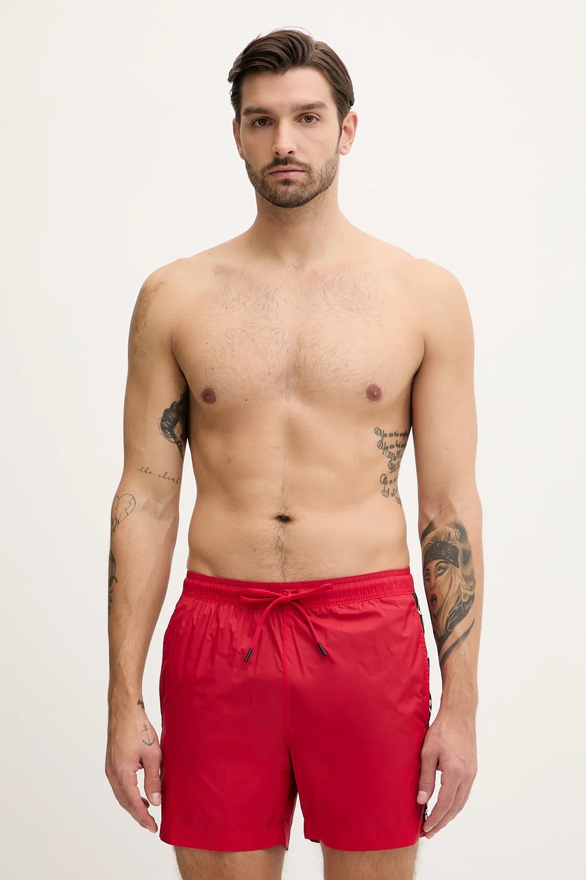 Levně Plavkové šortky HUGO FAB šedá barva