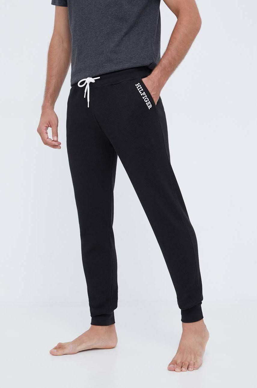 Levně Bavlněné pyžamové kalhoty Tommy Hilfiger černá barva, UM0UM03097