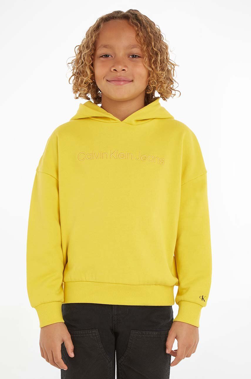 Dětská bavlněná mikina Calvin Klein Jeans žlutá barva, s kapucí, hladká