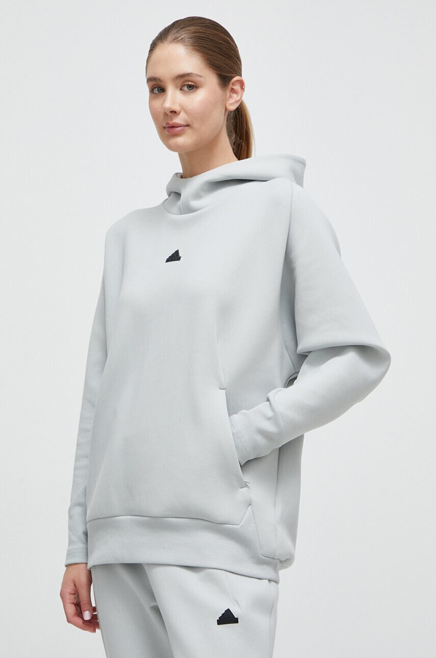 

Кофта adidas Z.N.E жіноча колір зелений з капюшоном з аплікацією