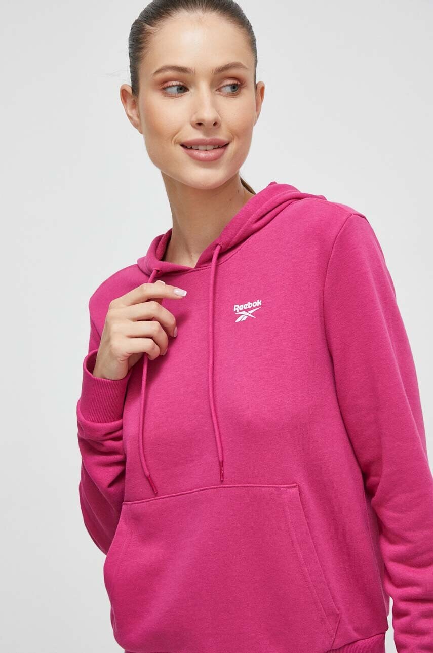 

Кофта Reebok жіноча колір рожевий з капюшоном однотонна