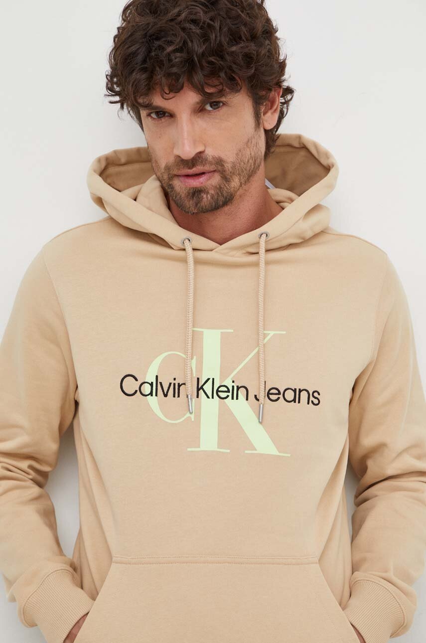 

Памучен суичър Calvin Klein Jeans в черно с качулка принт J30J320805, Бежов
