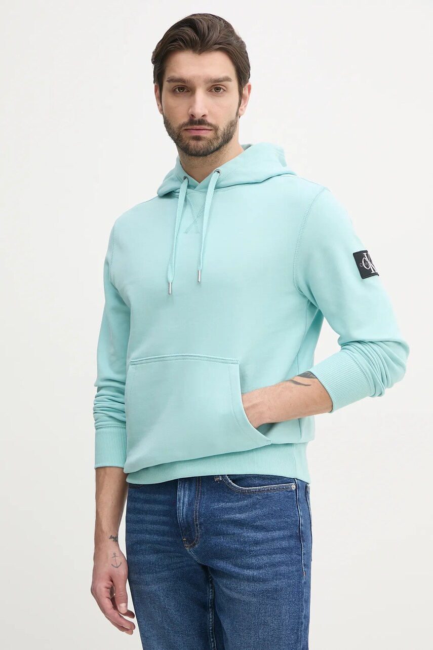 Levně Bavlněná mikina Calvin Klein Jeans pánská, tyrkysová barva, s kapucí, s aplikací, J30J323430