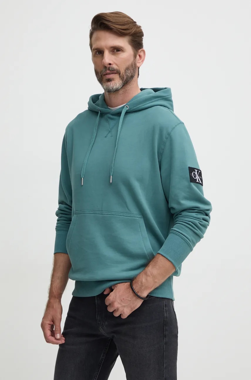 Levně Bavlněná mikina Calvin Klein Jeans pánská, zelená barva, s kapucí, s aplikací, J30J323430