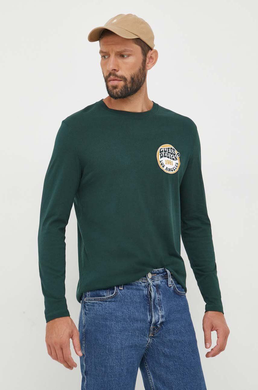 Bavlněné tričko s dlouhým rukávem Guess zelená barva, s aplikací - zelená - 100 % Bavlna