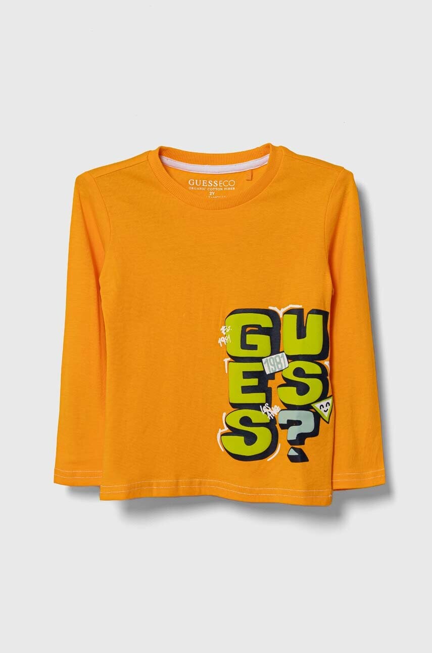 

Дитячий бавовняний лонгслів Guess колір помаранчевий з принтом