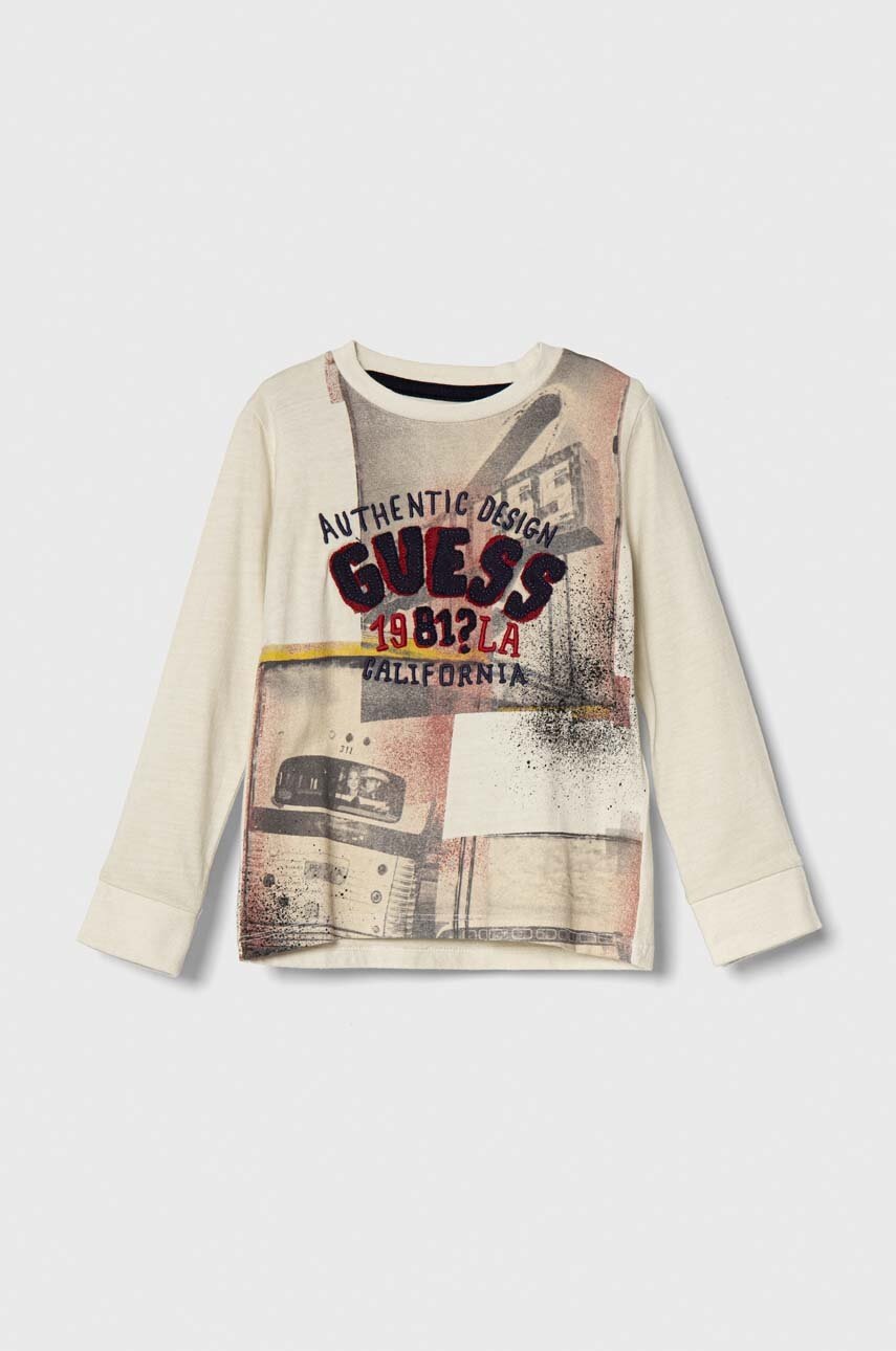 

Хлопковый детский лонгслив Guess цвет бежевый узорный