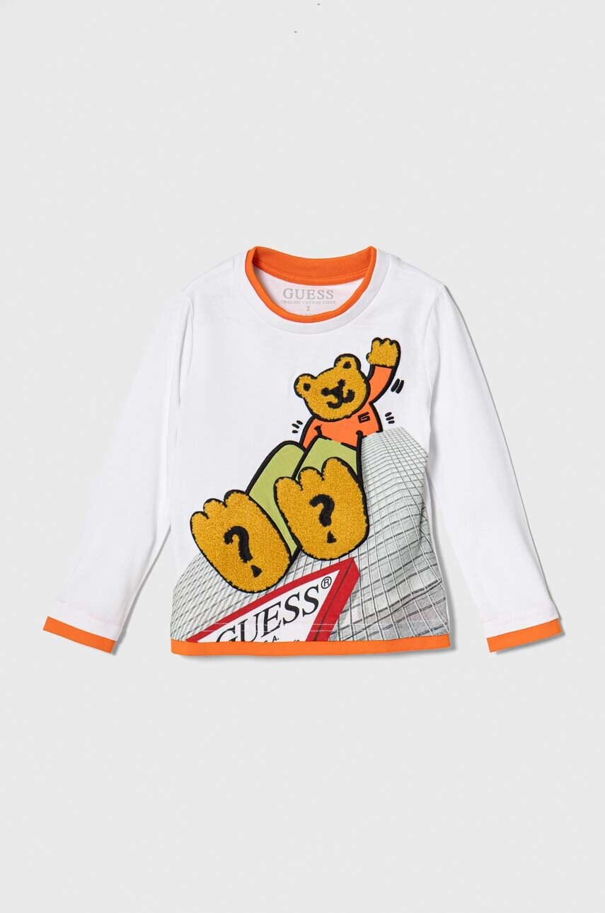 

Хлопковый детский лонгслив Guess цвет белый с принтом