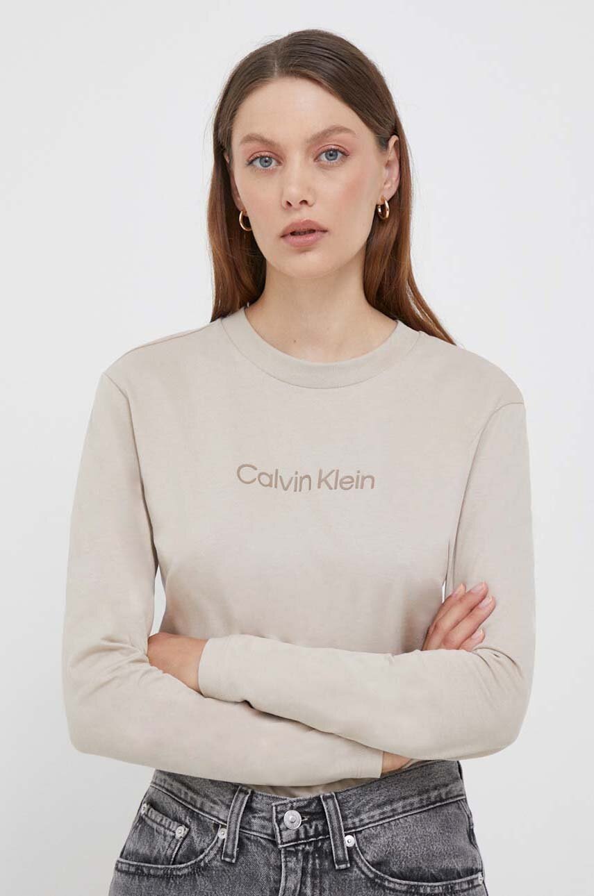

Памучна блуза с дълги ръкави Calvin Klein в бежово, Бежов