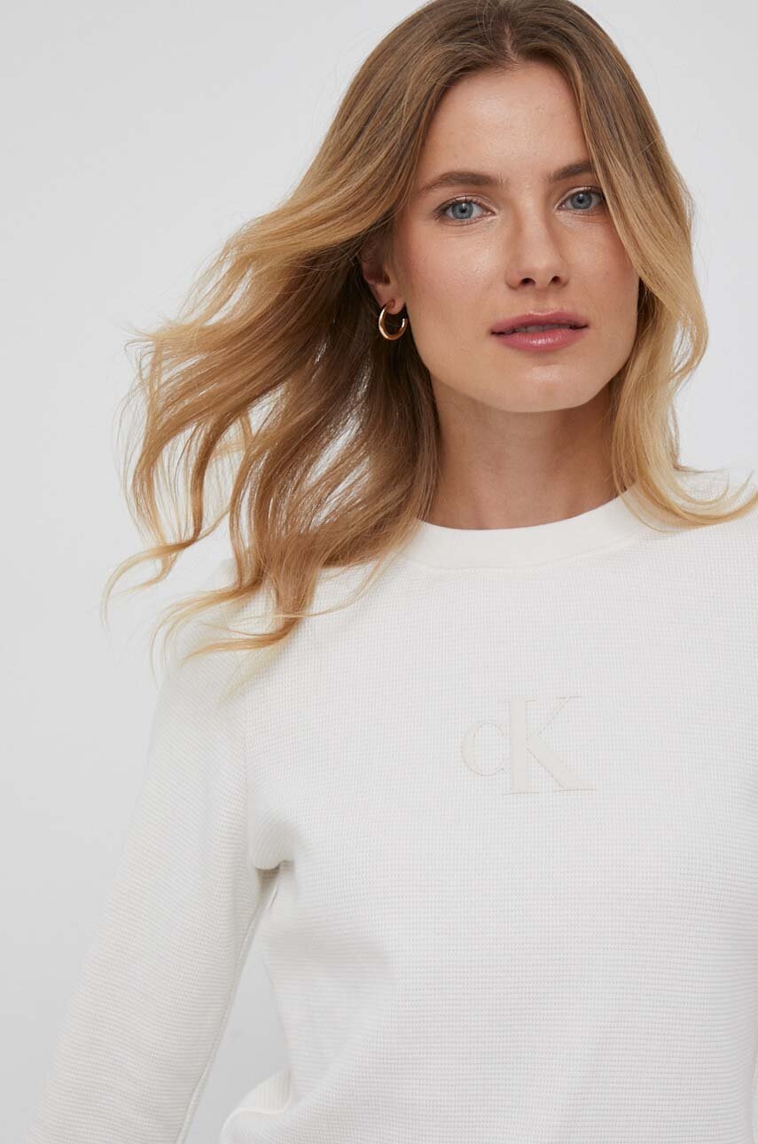 

Памучна блуза с дълги ръкави Calvin Klein Jeans в бежово, Бежов
