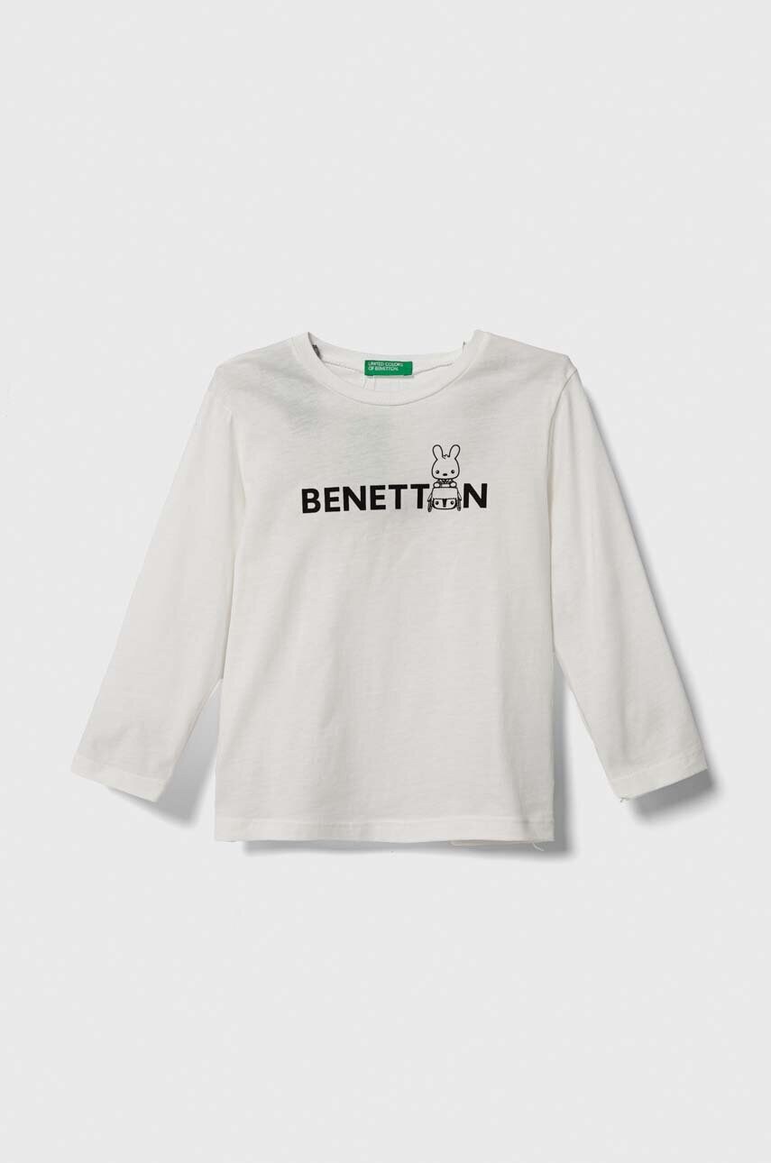 

Дитячий бавовняний лонгслів United Colors of Benetton колір бежевий з принтом