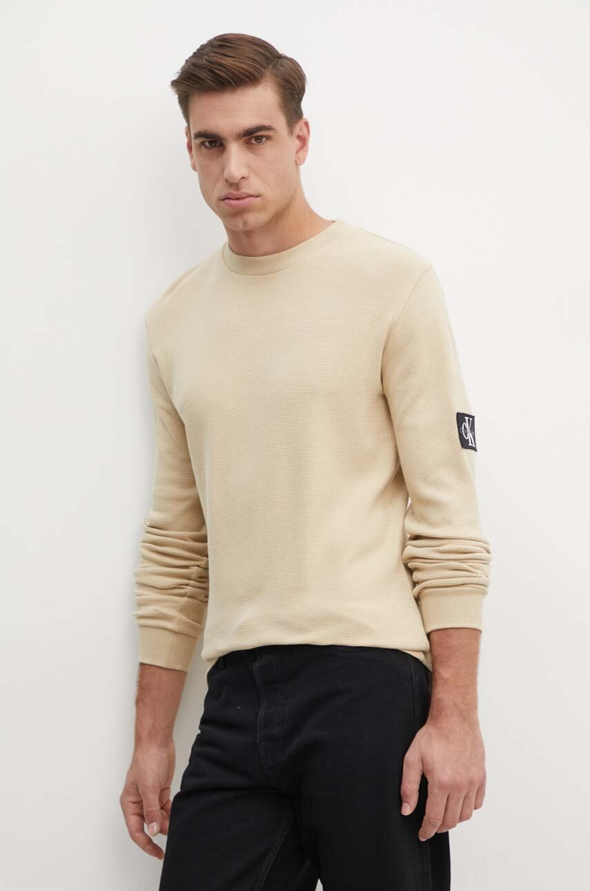 

Памучен суичър Calvin Klein Jeans в бежово с апликация J30J323485, Бежов